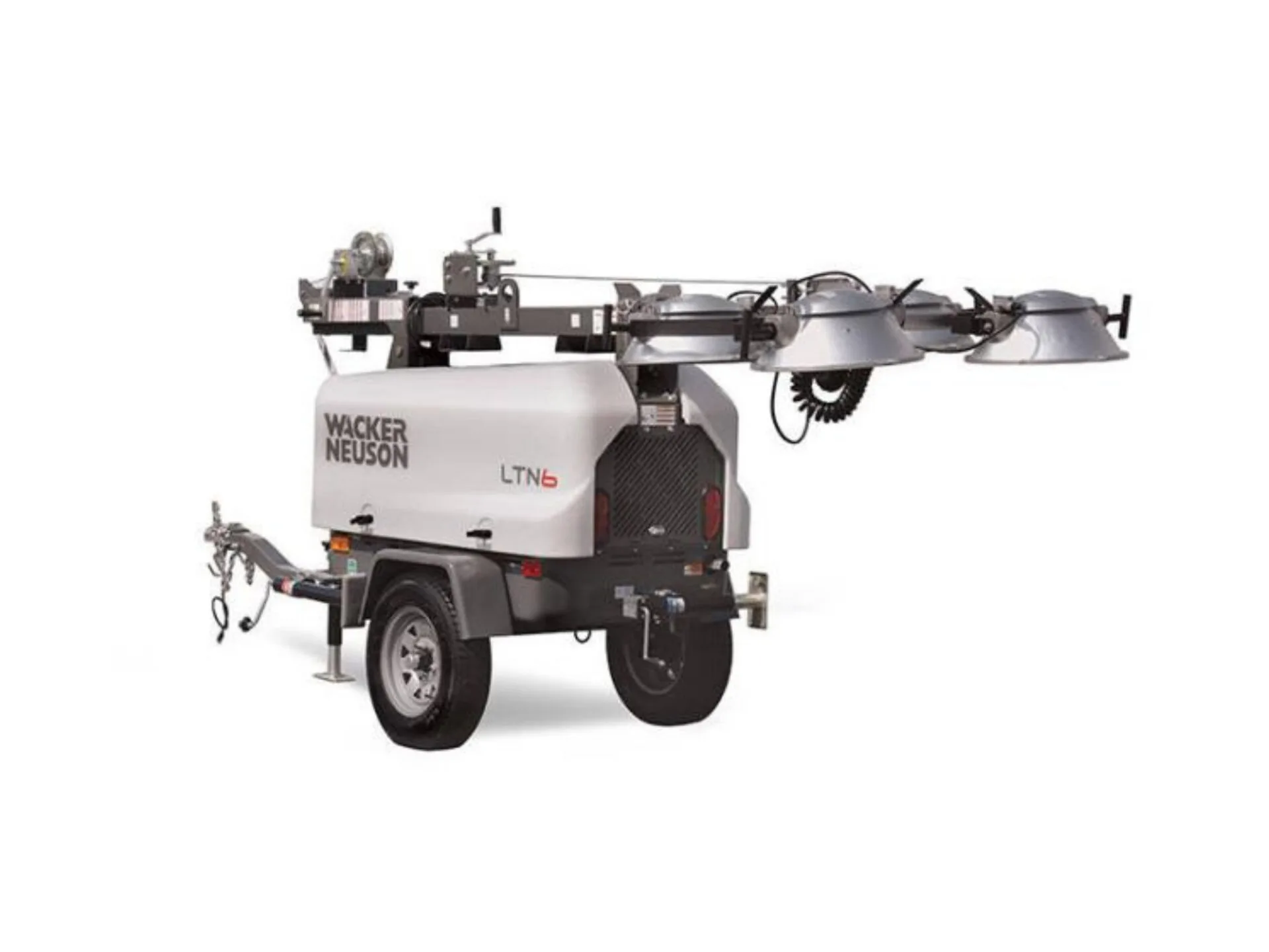 Portable Wacker Neuson light tower mounted on a trailer with adjustable floodlights for construction site illumination.