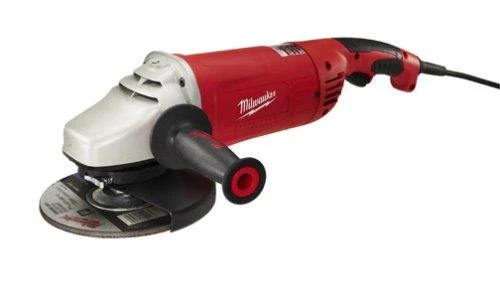 Red Milwaukee electric angle grinder with a side handle and a grinding disc attached.