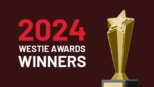 2024 Westie Awards trophy with bold red and white text announcing the winners on a dark background.